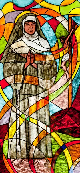 Stained glass showing the nun — Stock Photo, Image