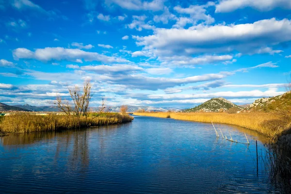 Wetland area in the south Croatian with clouds in the sky — Stock Photo, Image