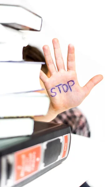 Palm of books with the words Stop — Stock Photo, Image