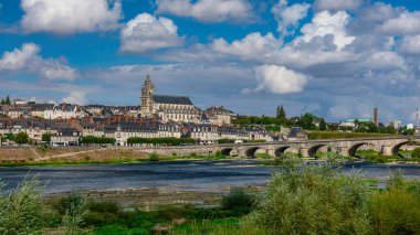 Blois and The Jacques-Gabriel Bridge, with the cathedral behind, over the Loire river, France