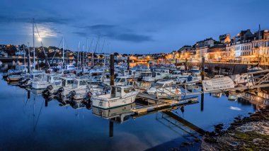 Night view on the harbor of Audierne, Brittany, France