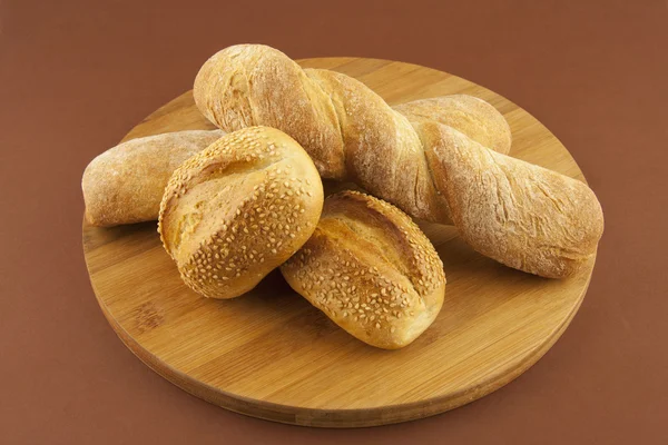 Bread on a wooden board — Stock Photo, Image