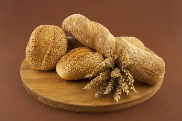 Bread on a wooden board — Stock Photo, Image