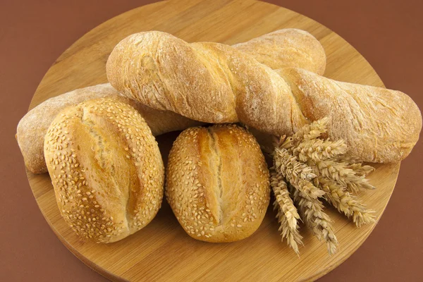 Bread on a wooden board — Stock Photo, Image