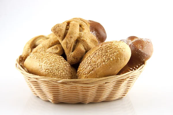 Bread and pastries on a basket — Stock Photo, Image