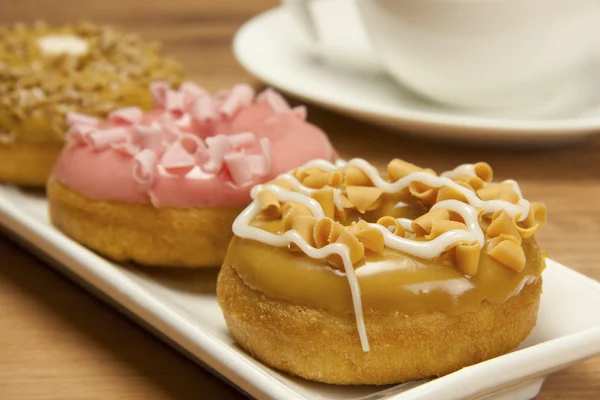 Donuts doces e copo de cacau — Fotografia de Stock