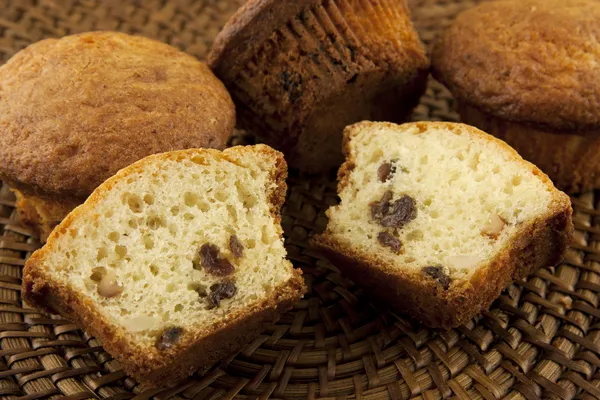 Sweet muffins with raisins and peanuts — Stock Photo, Image