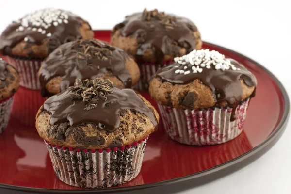 Chocolate muffins with sweet cream — Stock Photo, Image