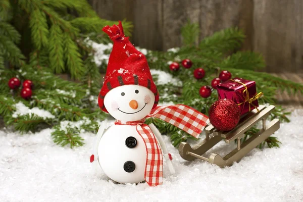 Happy snowman with christmas decoration — Stock Photo, Image