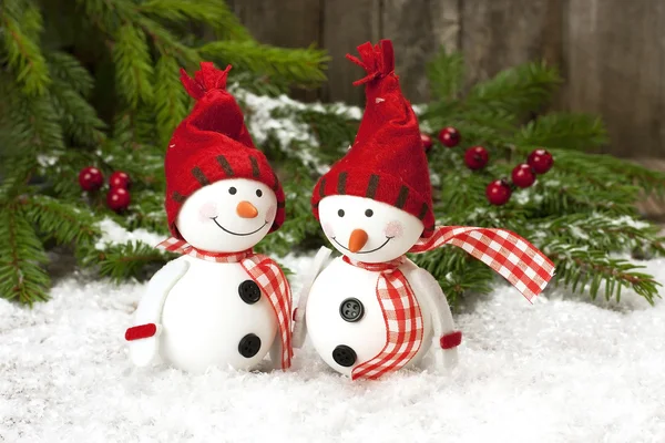 Happy snowman with christmas decoration — Stock Photo, Image