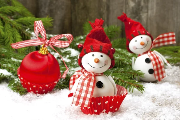 Two smiling snowmen friends in the snow — Stock Photo, Image
