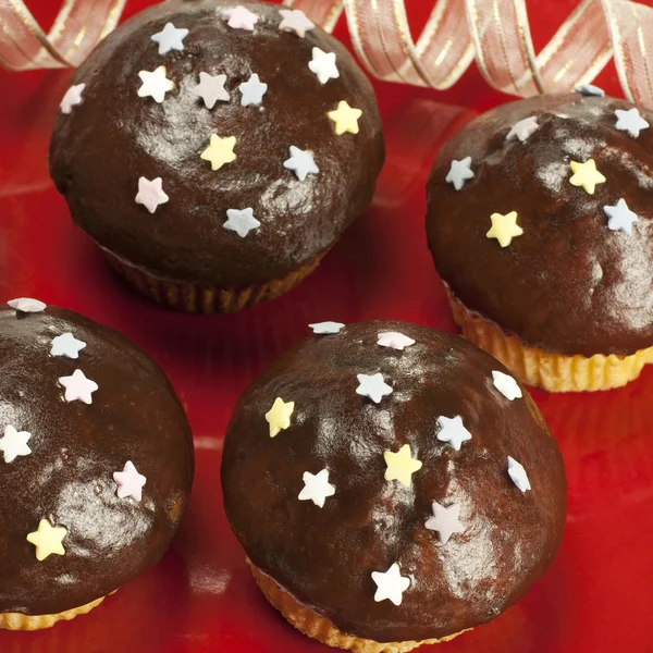 Sweet chocolate muffins with decorations — Stock Photo, Image