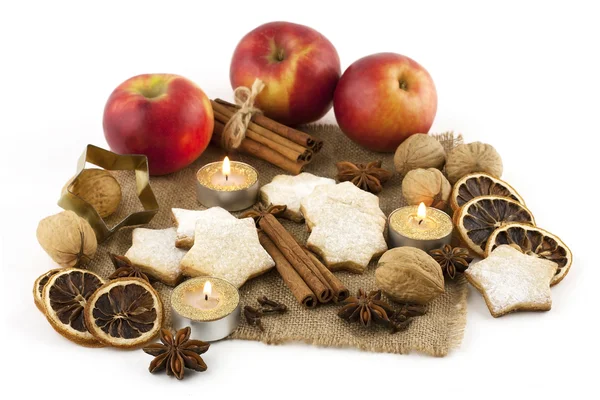 Christmas still life with cookies, candle and spices — Stock Photo, Image