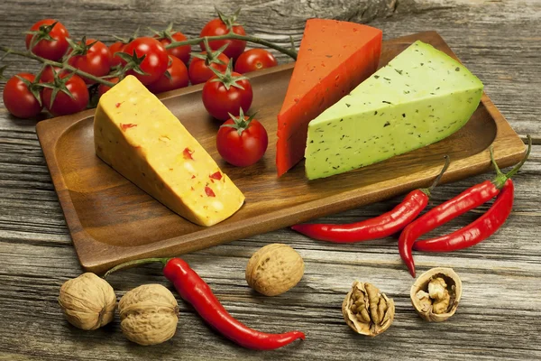 Cheese various assortment on wooden board — Stock Photo, Image