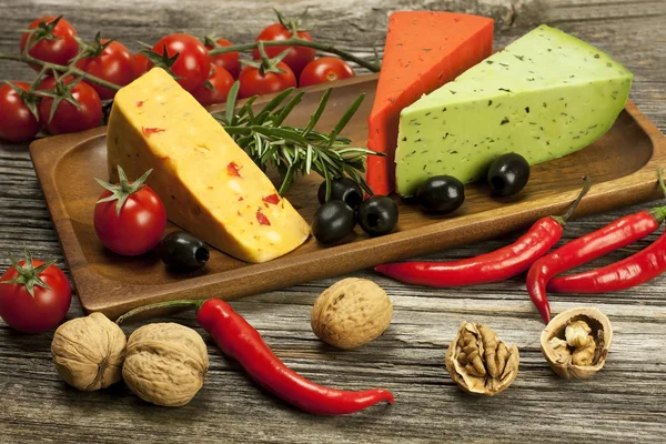 Cheese various assortment on wooden board — Stock Photo, Image