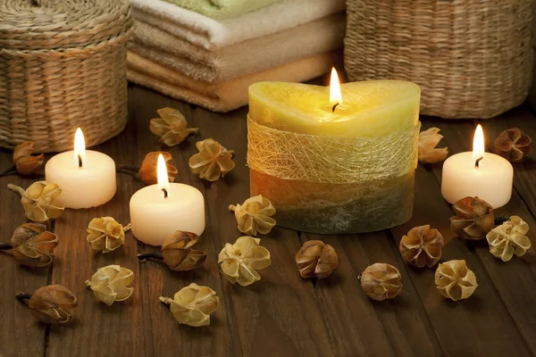 Spa candles with dried flowers — Stock Photo, Image