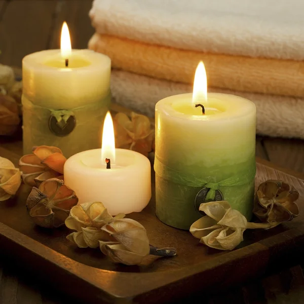 Spa candles with dried flowers — Stock Photo, Image