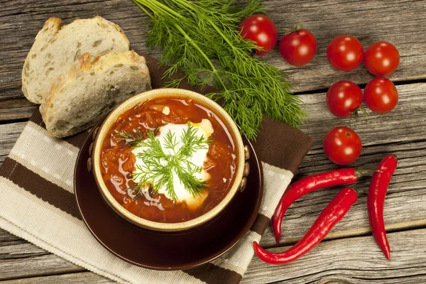 Red borscht with dill in ceramic  bowl — Stock Photo, Image