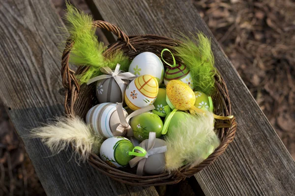 Easter Eggs in little basket — Stock Photo, Image