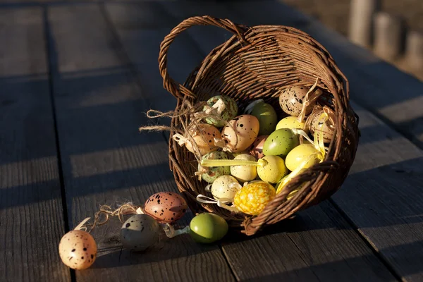 Easter Eggs in little basket — Stock Photo, Image