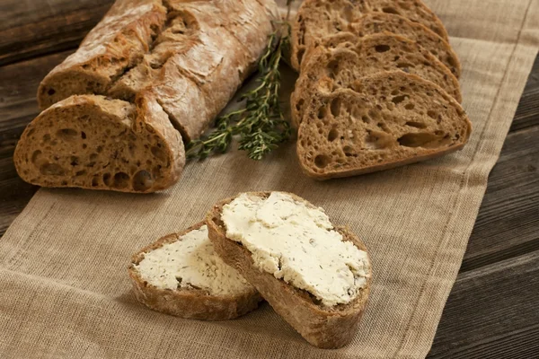Freshly baked traditional bread with butter cream — Stock Photo, Image