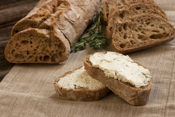 Freshly baked traditional bread with butter cream — Stock Photo, Image