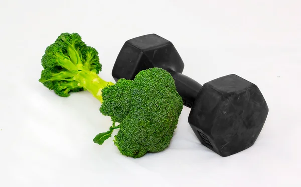 Dumbell en brocoli sur fond blanc. Focus devant . — Photo