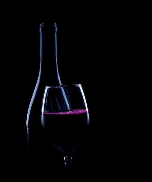 Red wine bottle and full glass — Stock Photo, Image