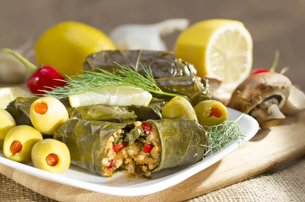 Grape leaves stuffed with rice. Royalty Free Stock Photos