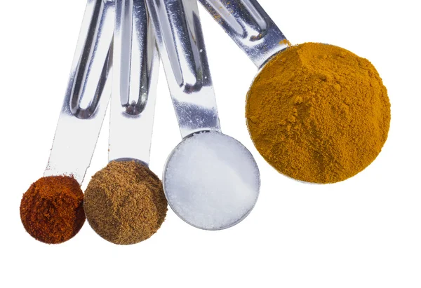 Spices in measuring spoons. — Stock Photo, Image