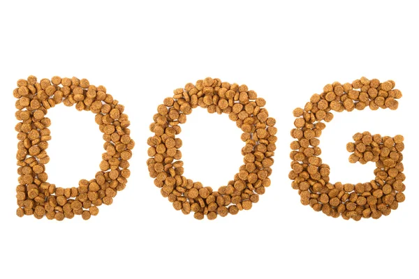 Wort Hund mit Granulat geschrieben — Stockfoto
