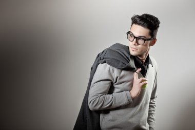 attractive man dressed casual wearing glasses - studio shot, copy space