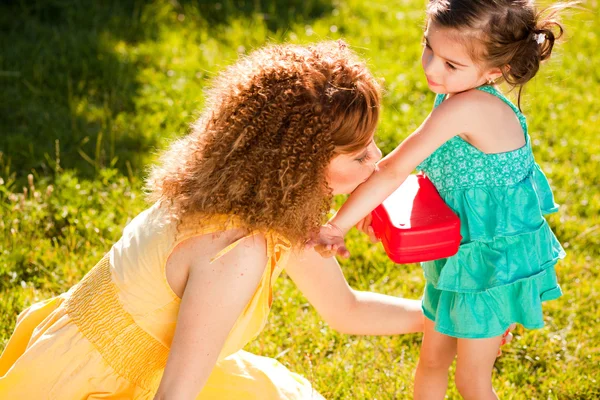 Mother and daughter outdoors — Stock Photo, Image