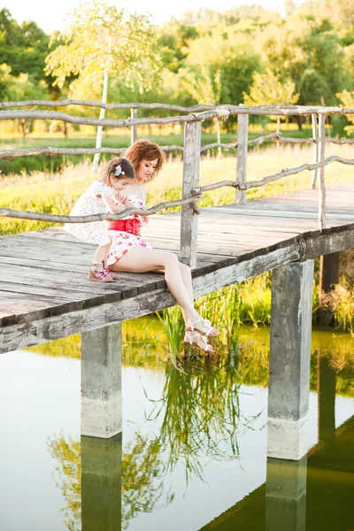 Mother and daughter outdoors — Stock Photo, Image