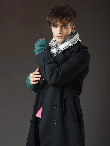 Attractive young male model posing in the studio — Stock Photo, Image