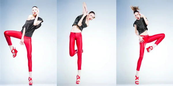 Sexy model with slim body dressed in red jumping in the studio a — Stock fotografie