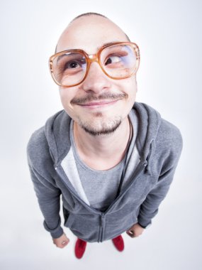 funny man with big glasses cross looking and smiling clipart