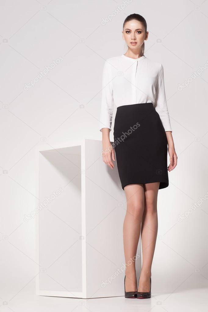 Woman with sexy legs dressed elegant