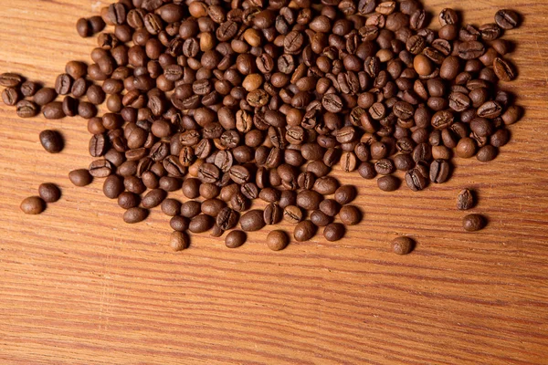 Coffee bean on wooden background — Stock Photo, Image