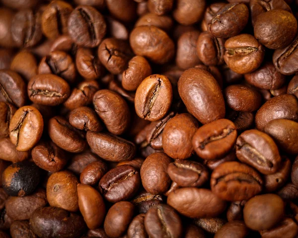 Macro photo of coffee beans, low depth of focus Royalty Free Stock Images