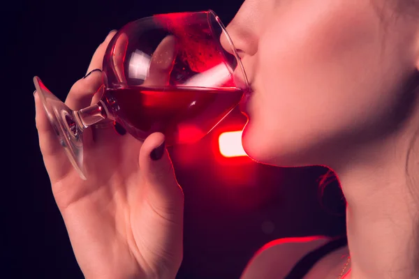 Beautiful blonde drinking red wine — Stock Photo, Image