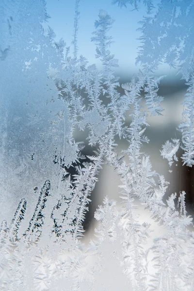 Patrones de hielo en vidrio de invierno —  Fotos de Stock