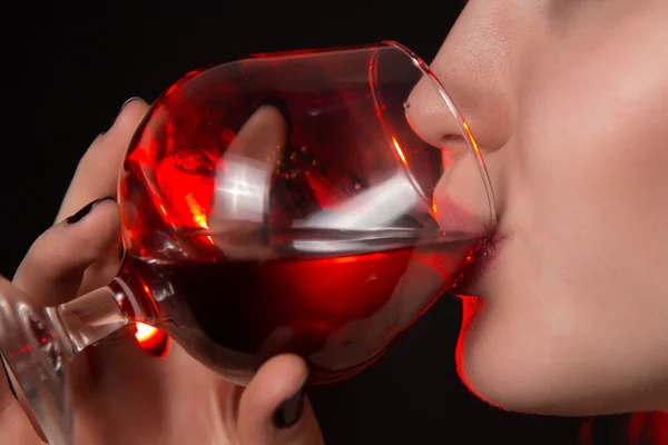 Beautiful blonde drinking red wine — Stock Photo, Image