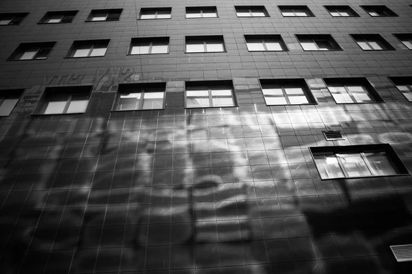 Glass office skyscrapers in black and white. — Stock Photo, Image