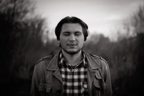 Vintage stylized black and white photo of young male model (Photo has an intentional film grain) — Stock Photo, Image