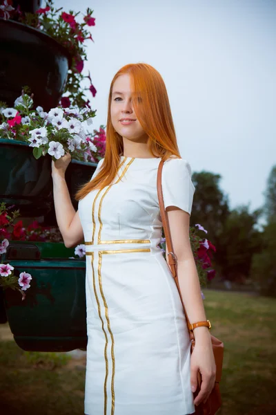 Young woman in white dress — Stock Photo, Image