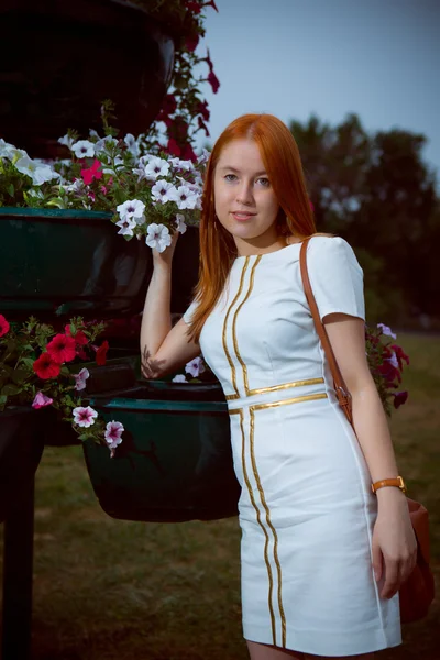 Young woman in white dress — Stock Photo, Image