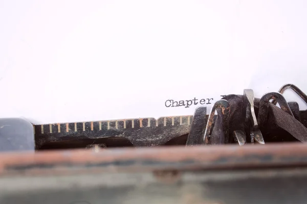 &quot;chapter one&quot; written on a typewriter — Stock Photo, Image