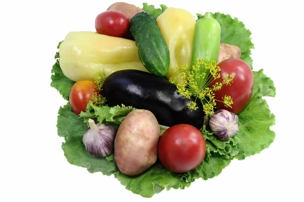 A variety of vegetables and salad. Presented on a white backgrou — Stock Photo, Image