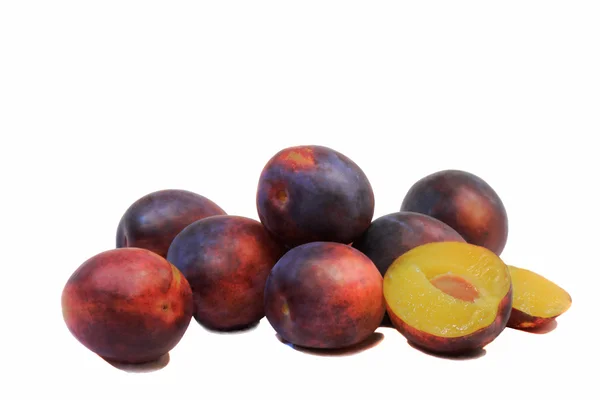Large ripe plums on a white background. — Stock Photo, Image